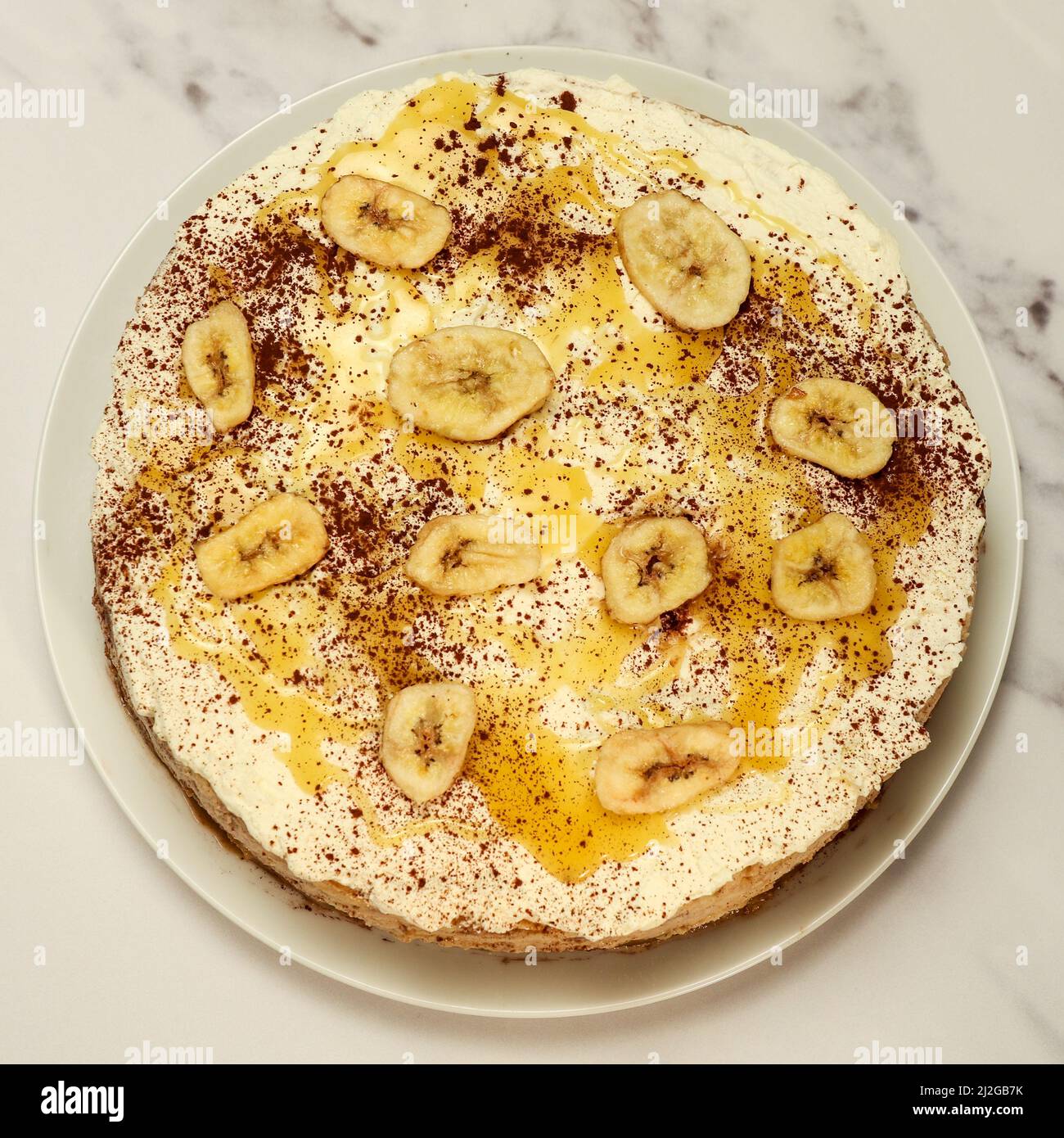 carameldrizzled banoffee bake from above Stock Photo Alamy