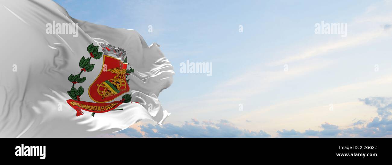 flag of Santos Sao Paulo , Brazil at cloudy sky background on sunset, panoramic view. Brazilian travel and patriot concept. copy space for wide banner Stock Photo