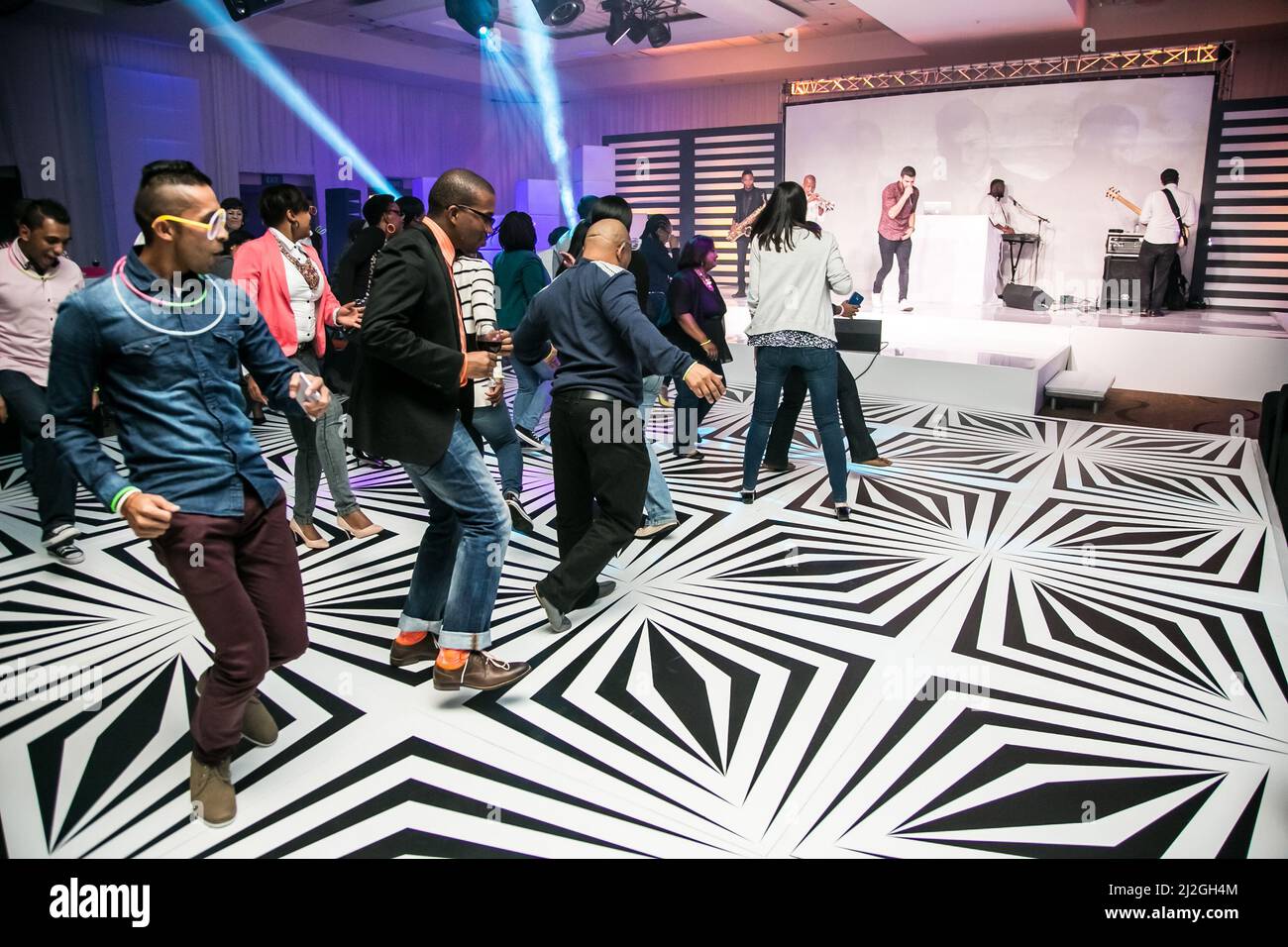 The people dancing on dance floor at party in Johannesburg, South