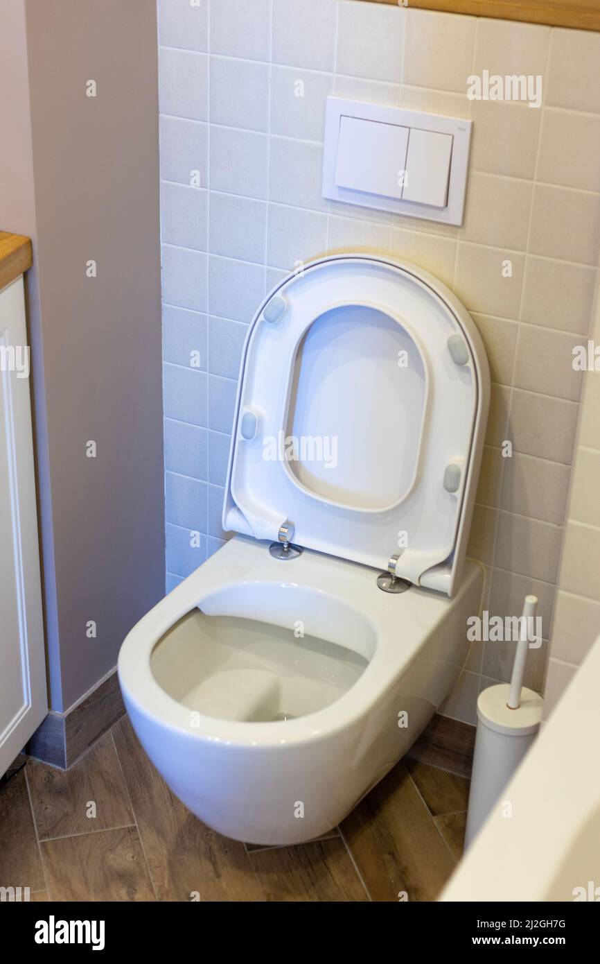 Toilet bowl white in the toilet with an open lid Stock Photo Alamy