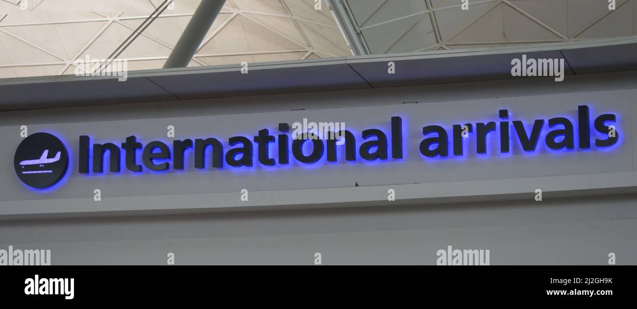 London, UK. March 16, 2022: A sign of International Arrivals at Stansted Airport. Stock Photo