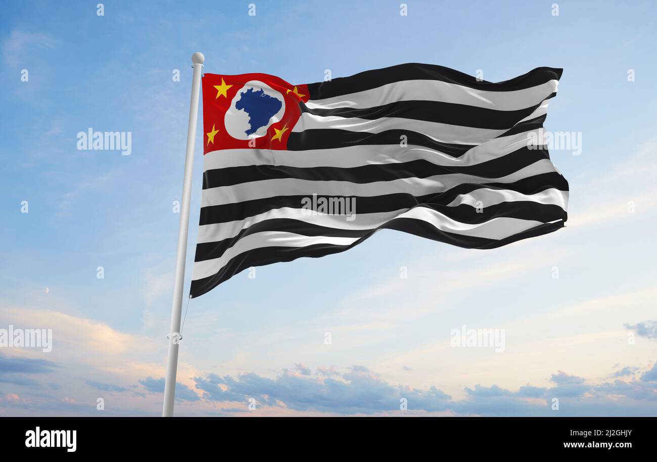 flag of estado de Sao Paulo , Brazil at cloudy sky background on sunset, panoramic view. Brazilian travel and patriot concept. copy space for wide ban Stock Photo