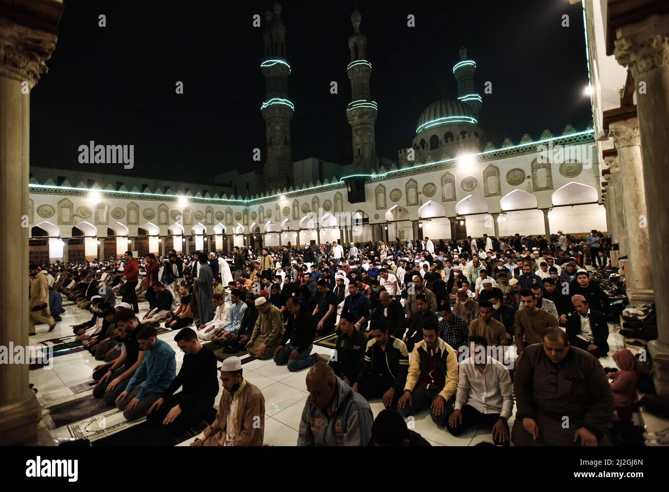 Cairo, Egypt. 01st Apr, 2022. Muslims perform the first 'Tarawih' evening prayers of the holy fasting month of Ramadan At Al-Azhar Mosque. Credit: Sayed Hassan/dpa/Alamy Live News Stock Photo