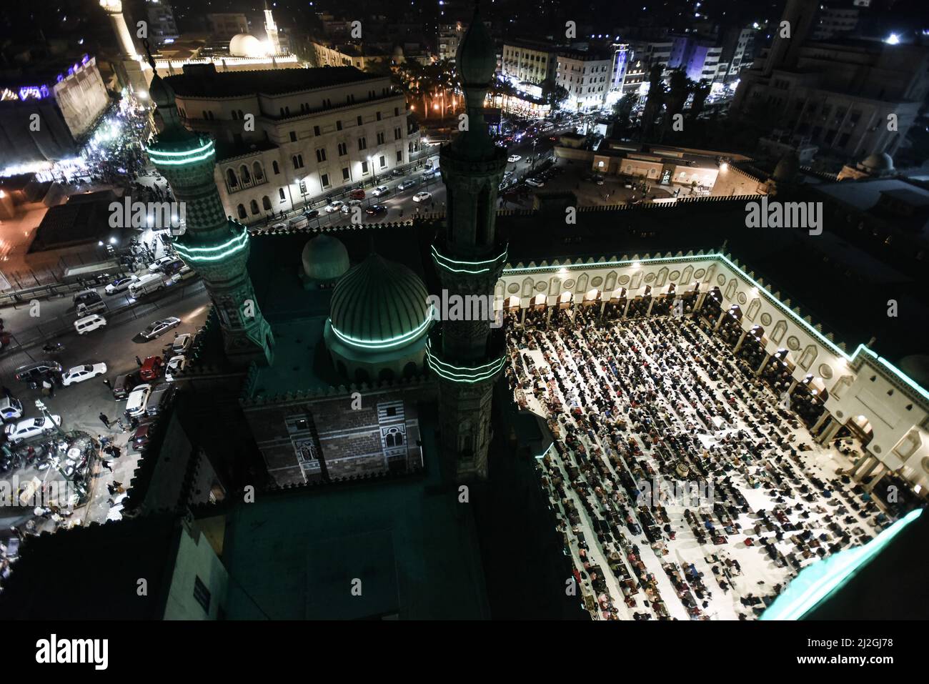 Cairo, Egypt. 01st Apr, 2022. Muslims perform the first 'Tarawih' evening prayers of the holy fasting month of Ramadan At Al-Azhar Mosque. Credit: Sayed Hassan/dpa/Alamy Live News Stock Photo