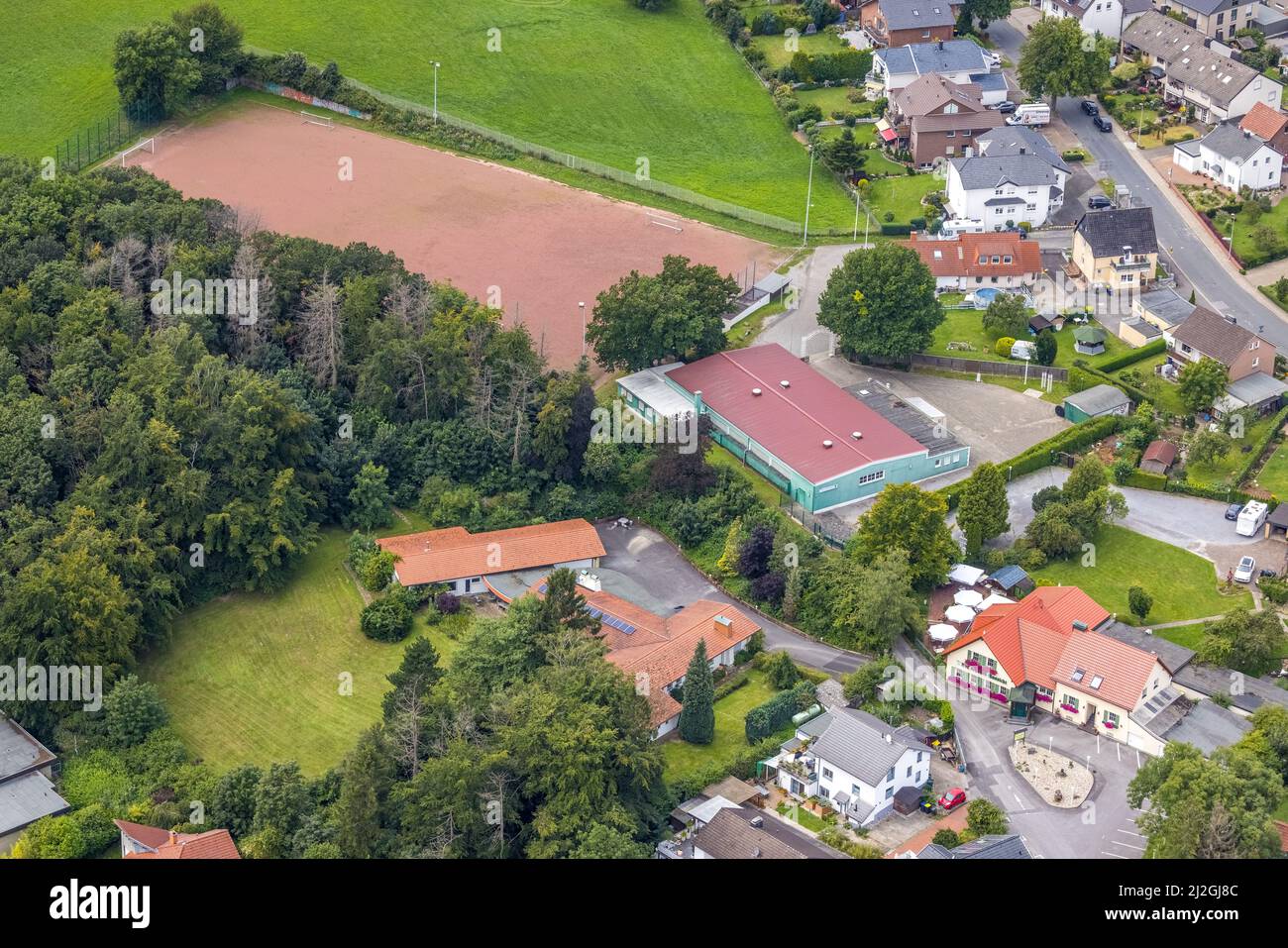 Aerial view, town view of , Luftbild, Ortsansicht Stadtteil Hohenheide und Schützenhalle mit Sportplatz SV Hohenheide, Fröndenberg/Ruhr, Ruhrgebiet, N Stock Photo
