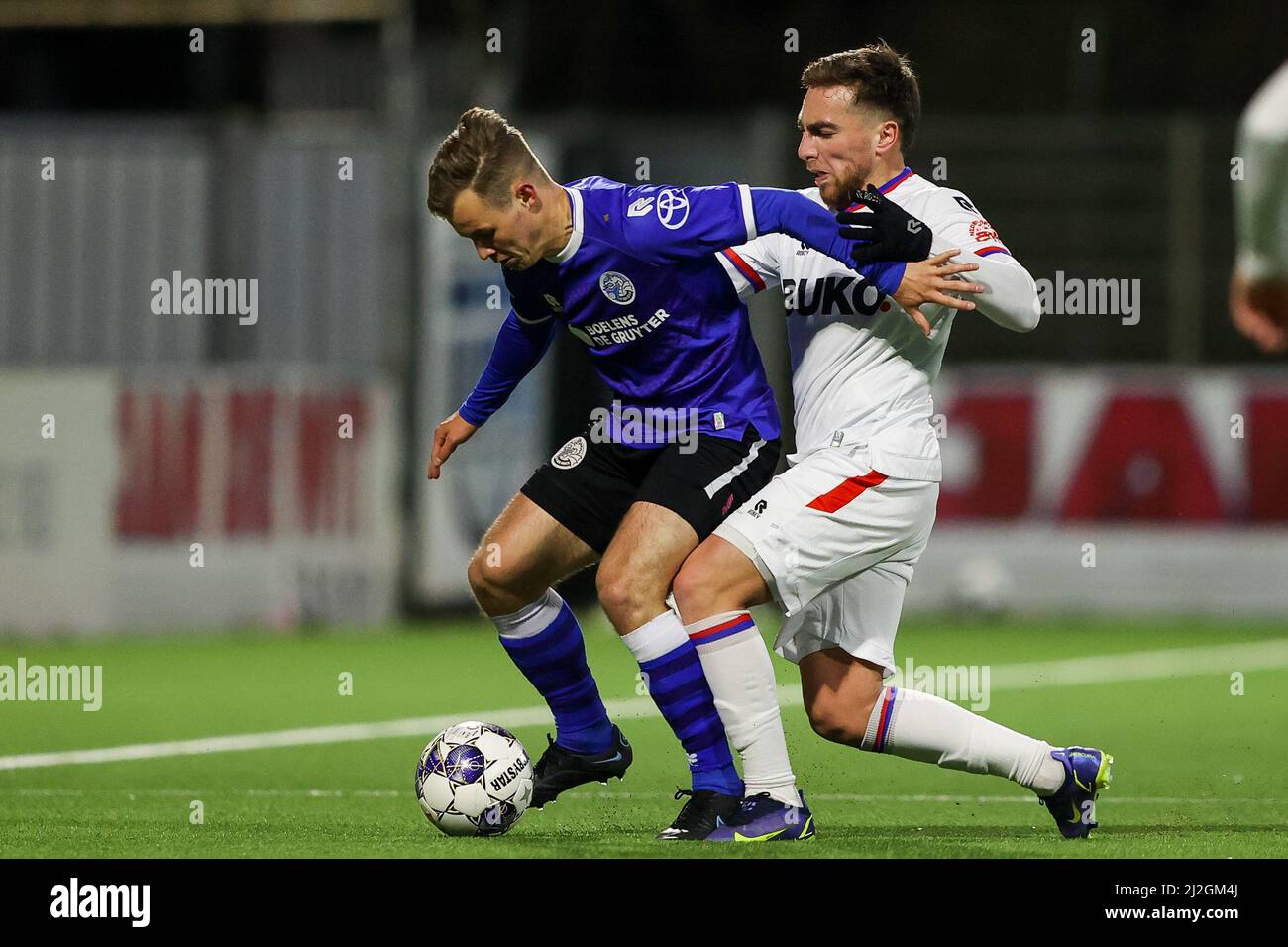 VELSEN-ZUID, NETHERLANDS - APRIL 1: Rik Mulders of FC Den Bosch, Ozan Kokcu  of SC Telstar during the Dutch Keukenkampioendivisie match between Telstar  and FC Den Bosch at Buko Stadium on April