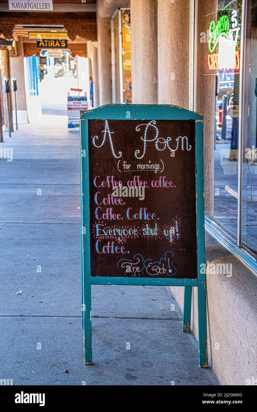 2018 09 23 Taos New Mexico USA - Sign on sidewalk  in front of Coffee Shop in downtown Taos with Poem - Coffee- Everyone Shut Up Stock Photo