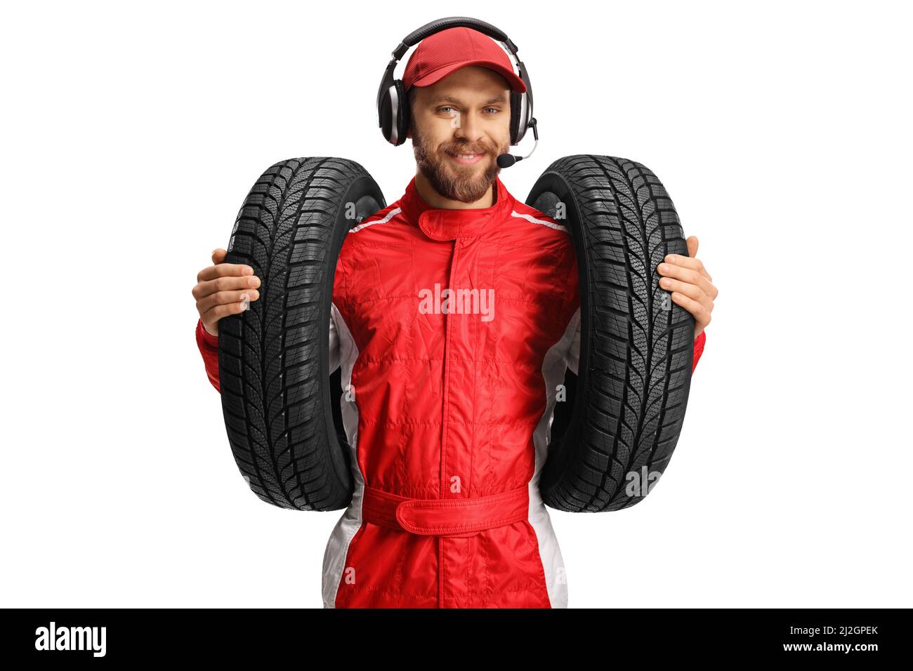 Race team member holding car tires isolated on white background Stock Photo