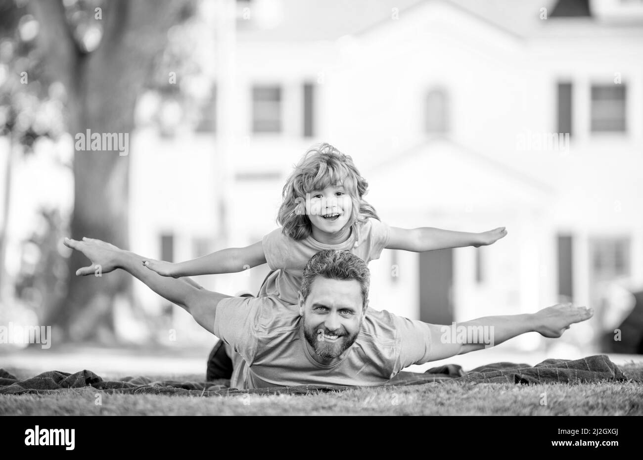 happy father and son having fun in park. family value. childhood and parenthood. Stock Photo