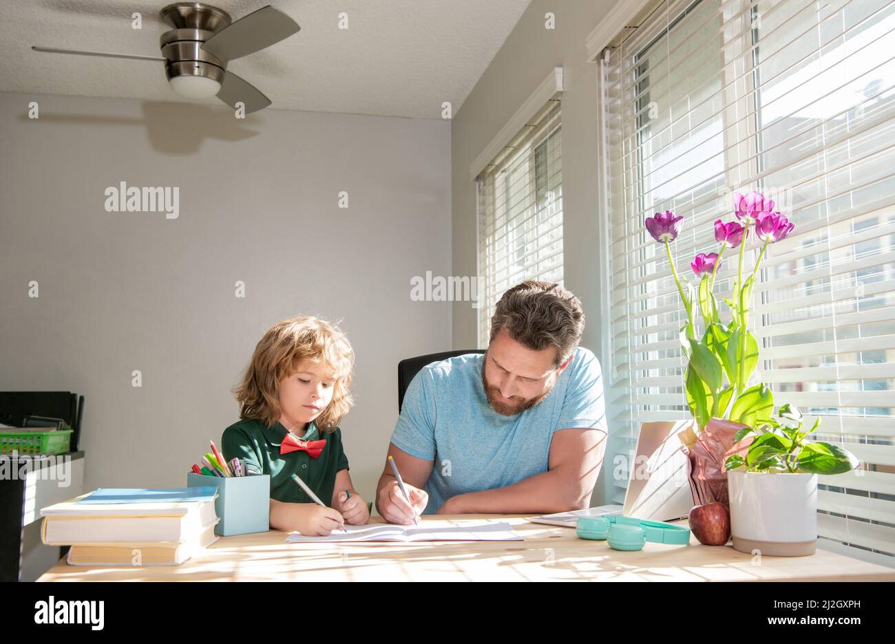 concentrated boy study with teacher. private drawing lesson. education concept. Stock Photo