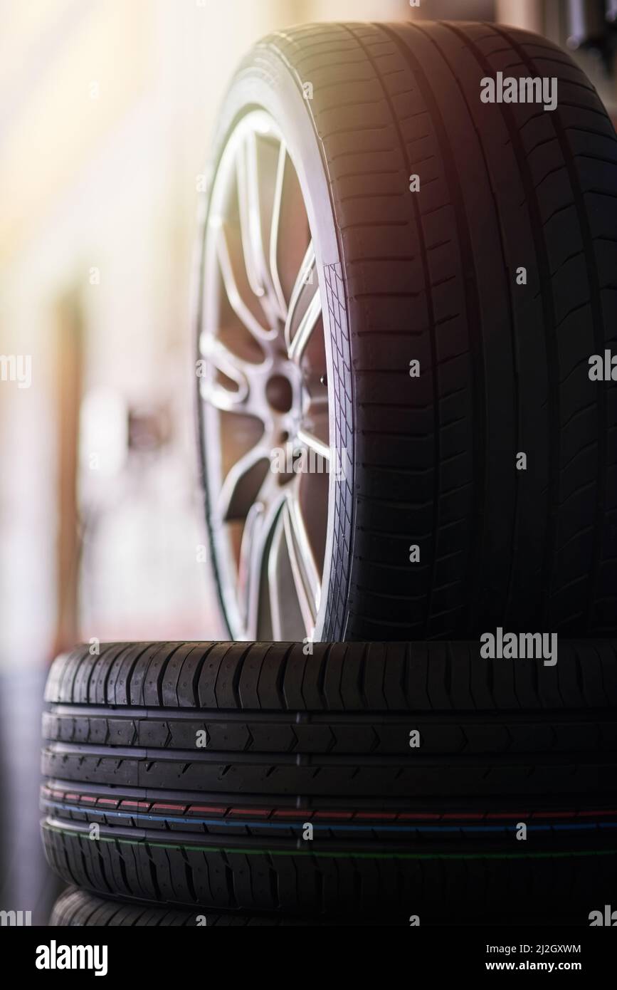 Wheels and tyres. Closeup shot of a pile of car tyres. Stock Photo
