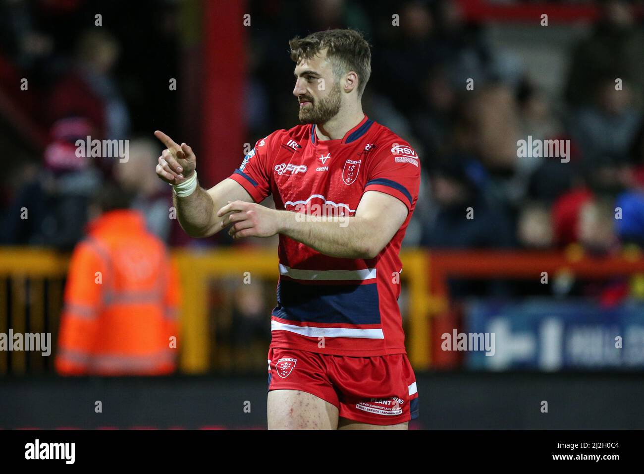 Tom Garratt #26 of Hull KR gestures to someone in the crowd after the