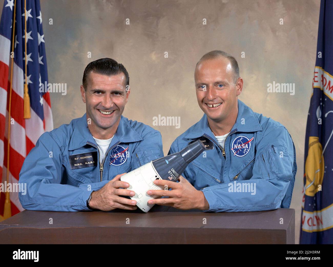 Astronauts Charles Conrad (right), prime crew command pilot, and Richard Gordon , prime crew pilot, for the Gemini 11 earth-orbital mission. Stock Photo