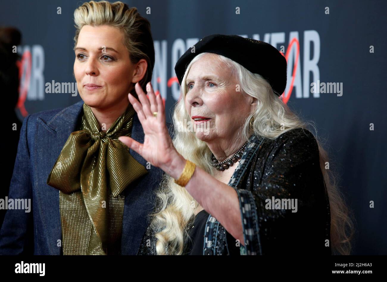 Brandi Carlile and musician and honoree Joni Mitchell arrive for the