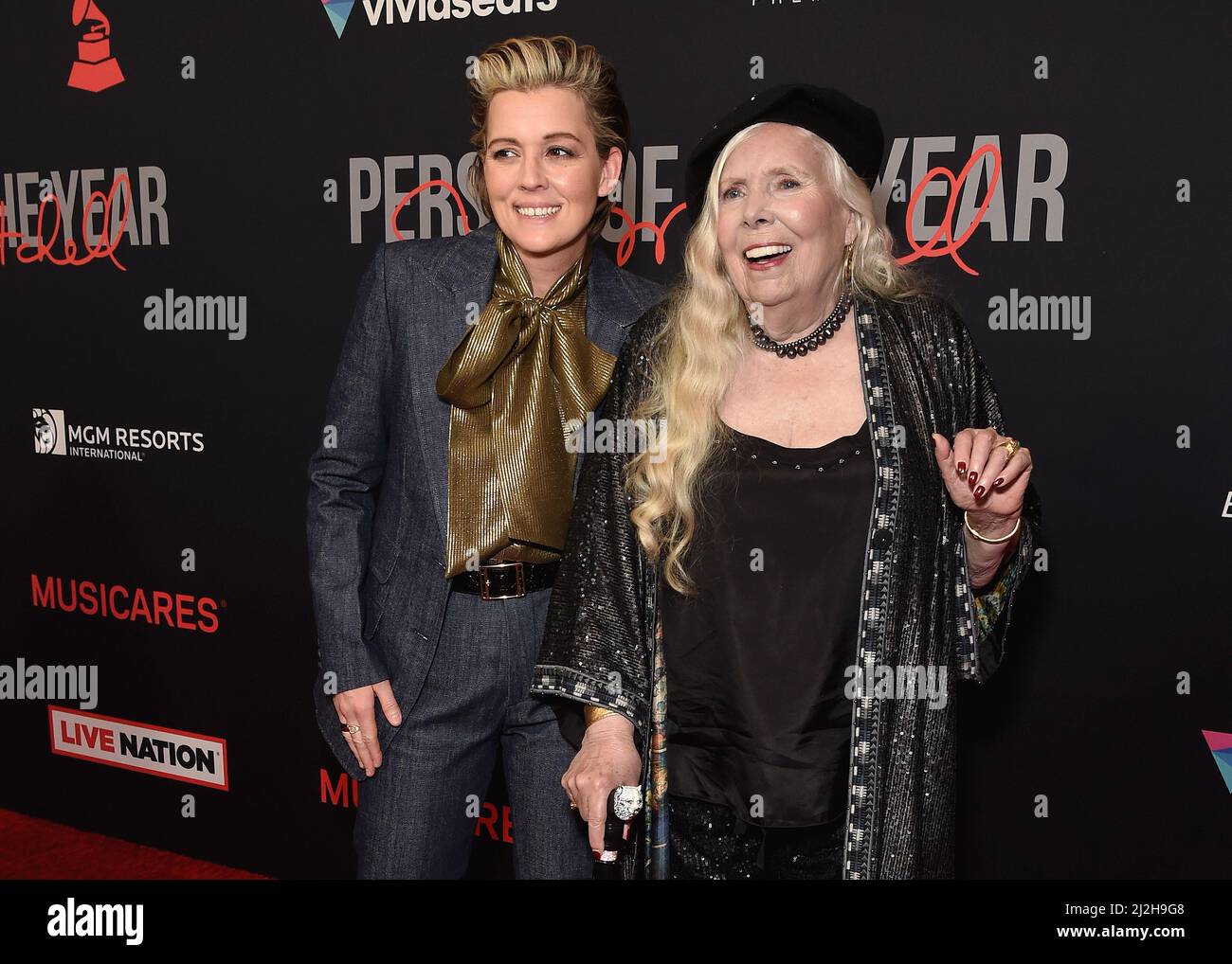 Brandi Carlile and Joni Mitchell walking on the red carpet at the 31st