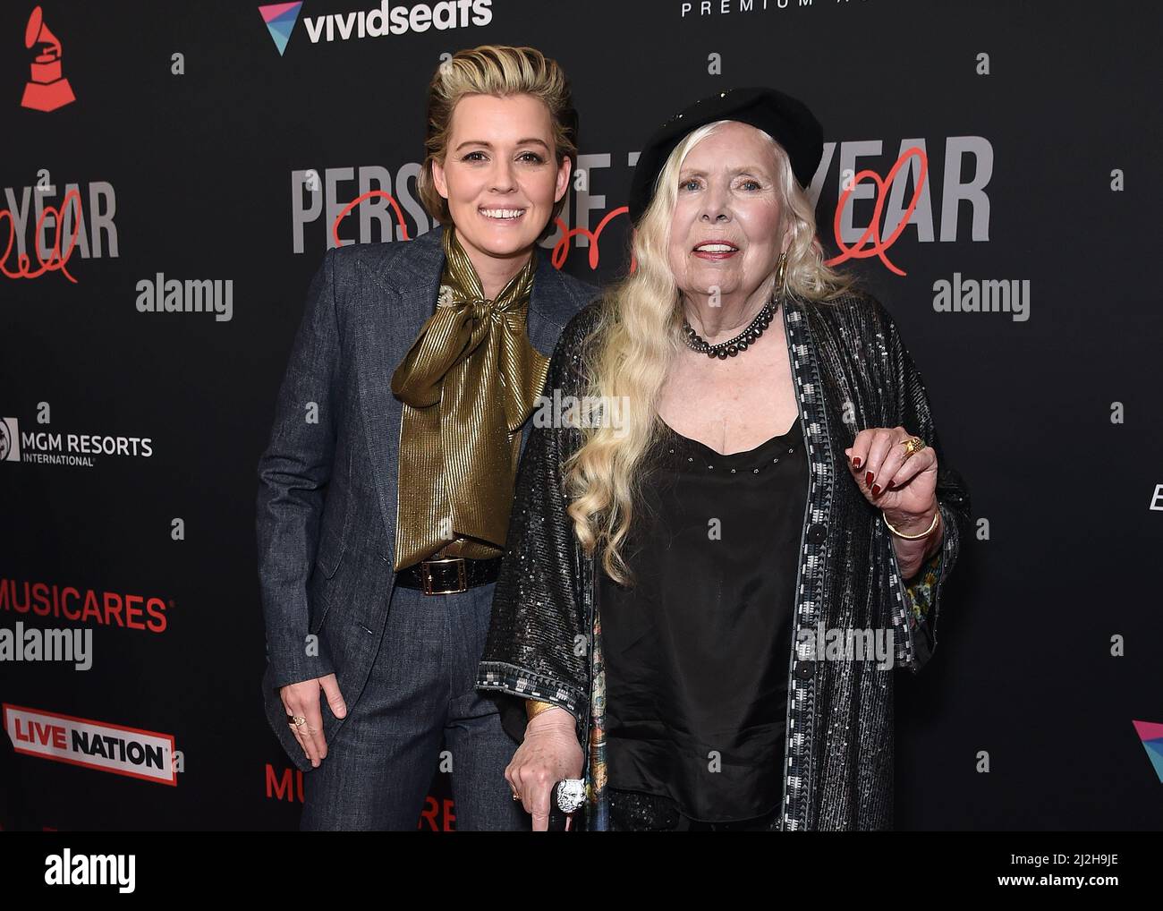 Brandi Carlile and Joni Mitchell walking on the red carpet at the 31st