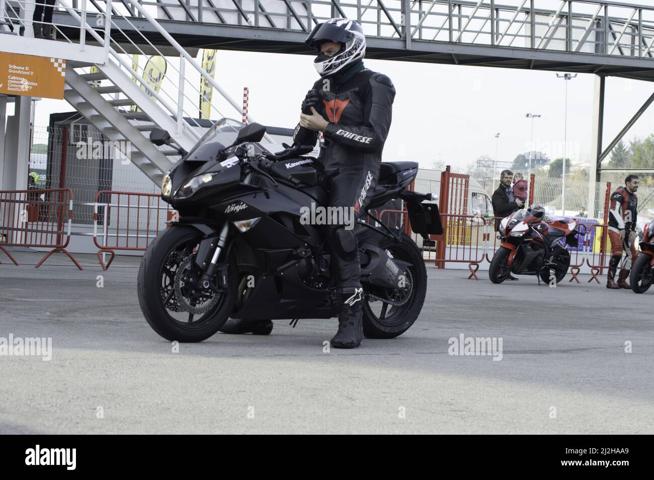 A racing sports motorbike on the track - Kawasaki Ninja Stock Photo