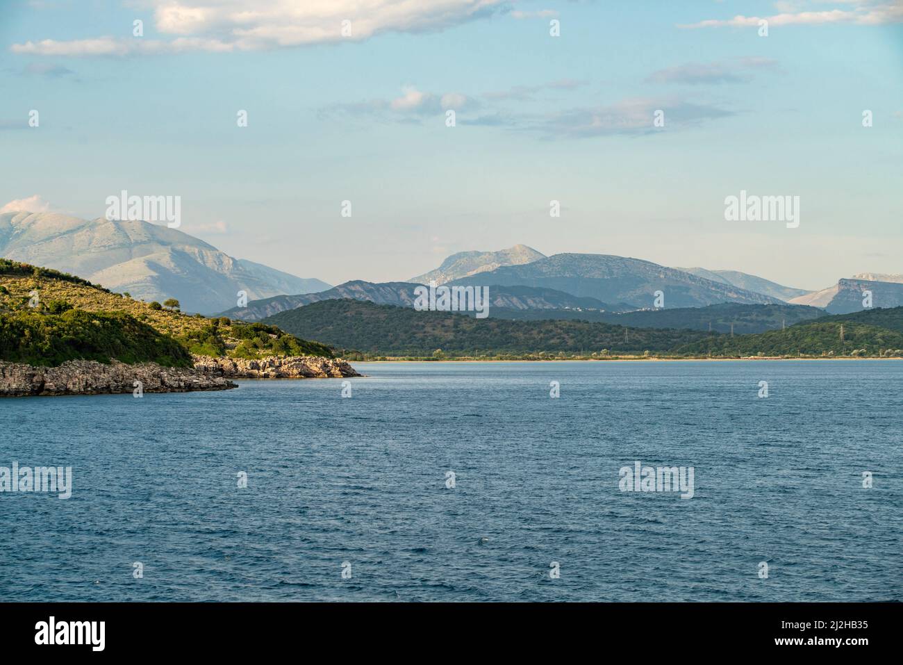 Greece, Igoumenitsa, Sea surrounded with hills Stock Photo
