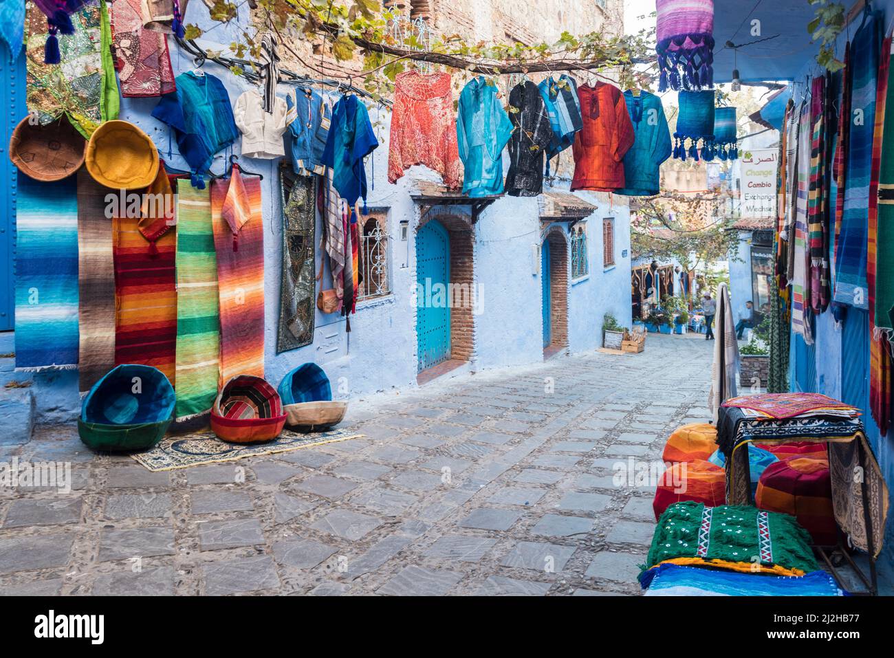 Morocco, Chefchaouen, Souvenirs for sale at traditional blue houses ...