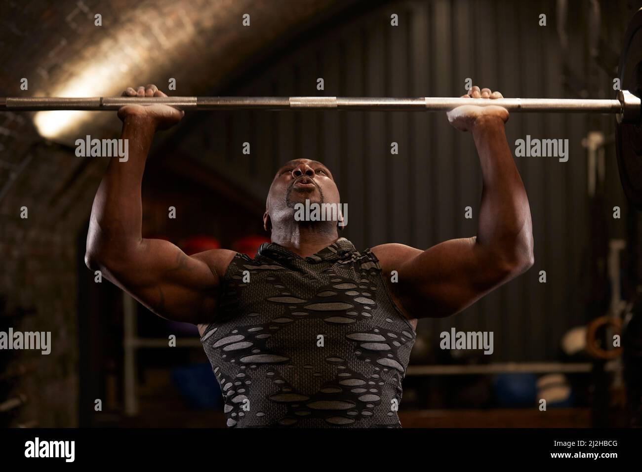 Man having weigh training in gym Stock Photo Alamy