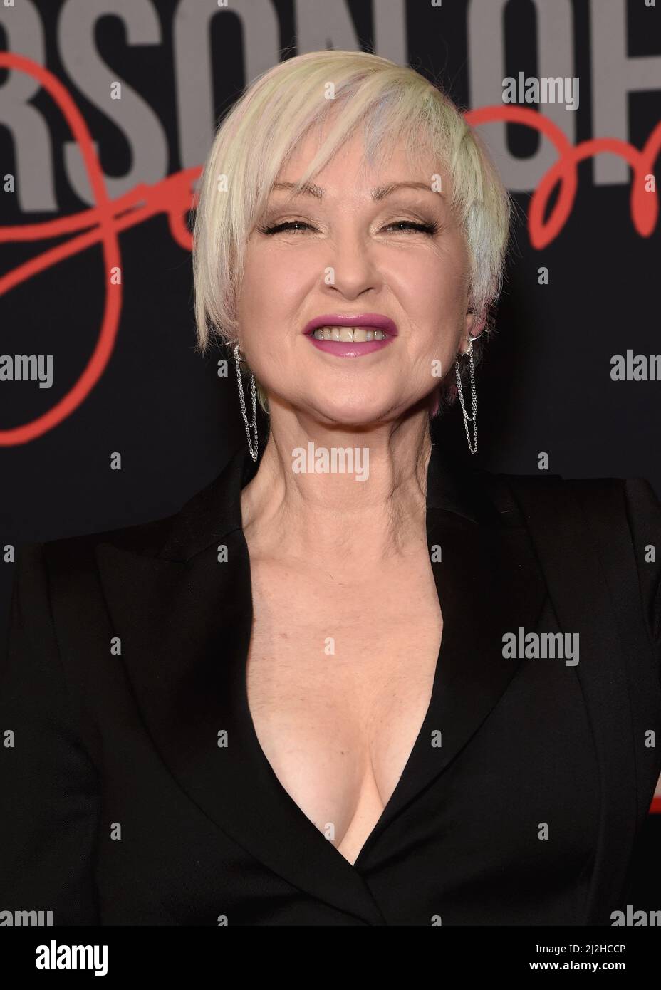 Cyndi Lauper walking on the red carpet at the 31st Annual MusiCares