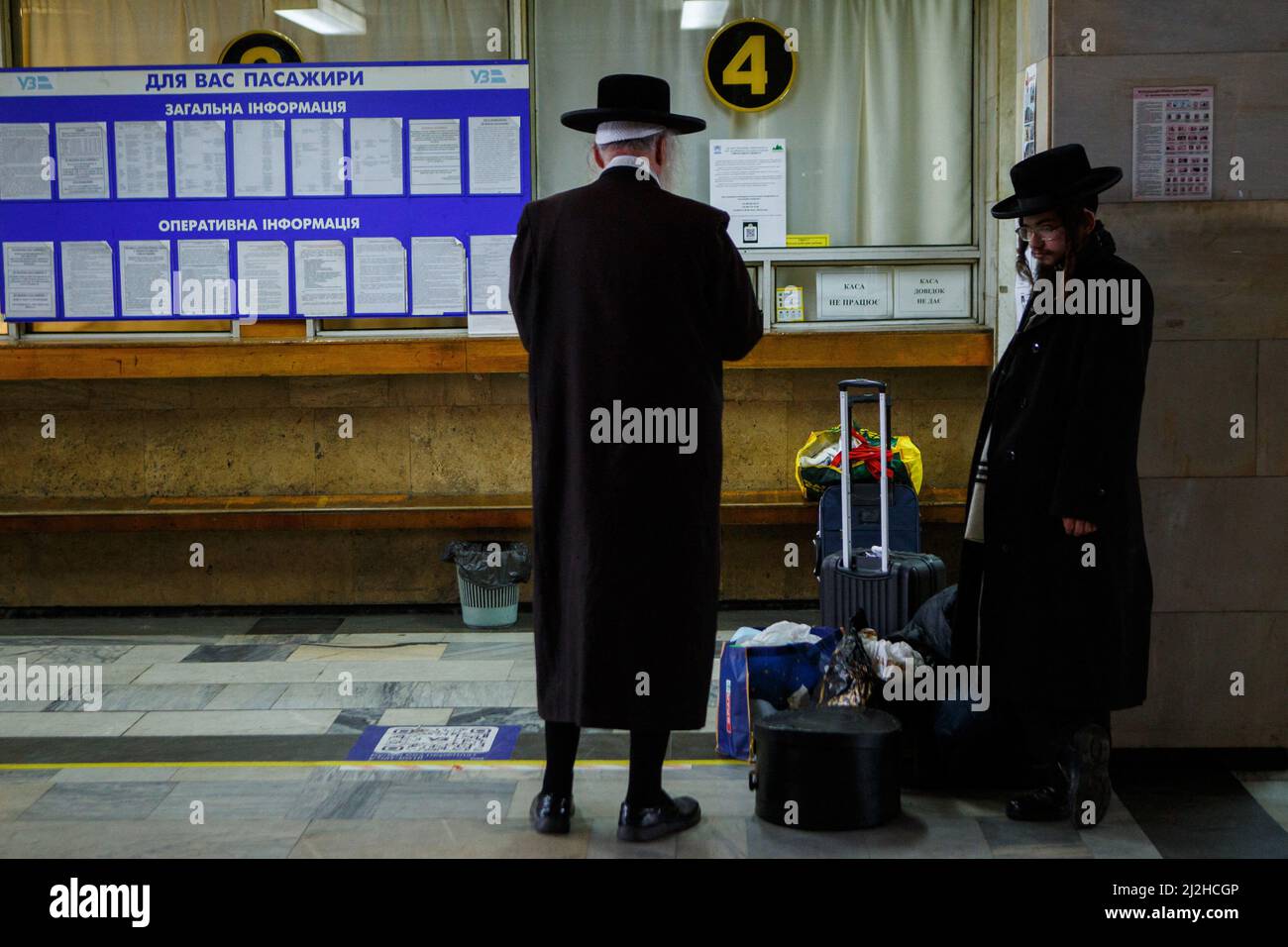 Hasidim are seen at the cashier's desk in the waiting room of the Chop International Railway Station, Zakarpattia, western Ukraine, April 1, 2022. More than four million Ukrainians have now fled the country to escape Russia's 'senseless war', the United Nations said Wednesday.The number of refugees has surpassed UNHCR's initial estimate that the war could create up to four million. The agency says the speed and scale of the displacement is unprecedented in Europe since World War II Photo by Serhii Hudak/Ukrinform/ABACAPRESS.COM Stock Photo