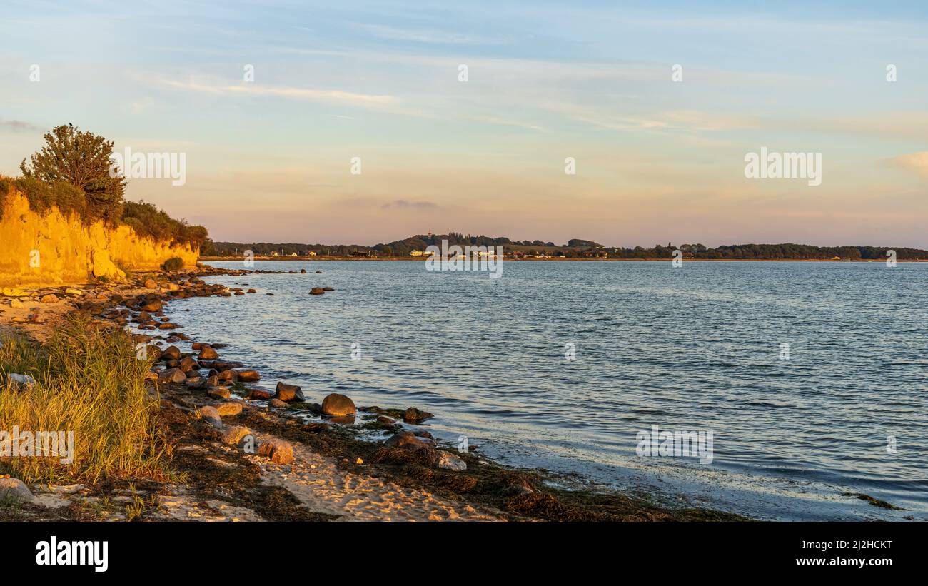 Evening light over the beach and cliffs in Klein Zicker, Mecklenburg-Western Pomerania, Germany Stock Photo