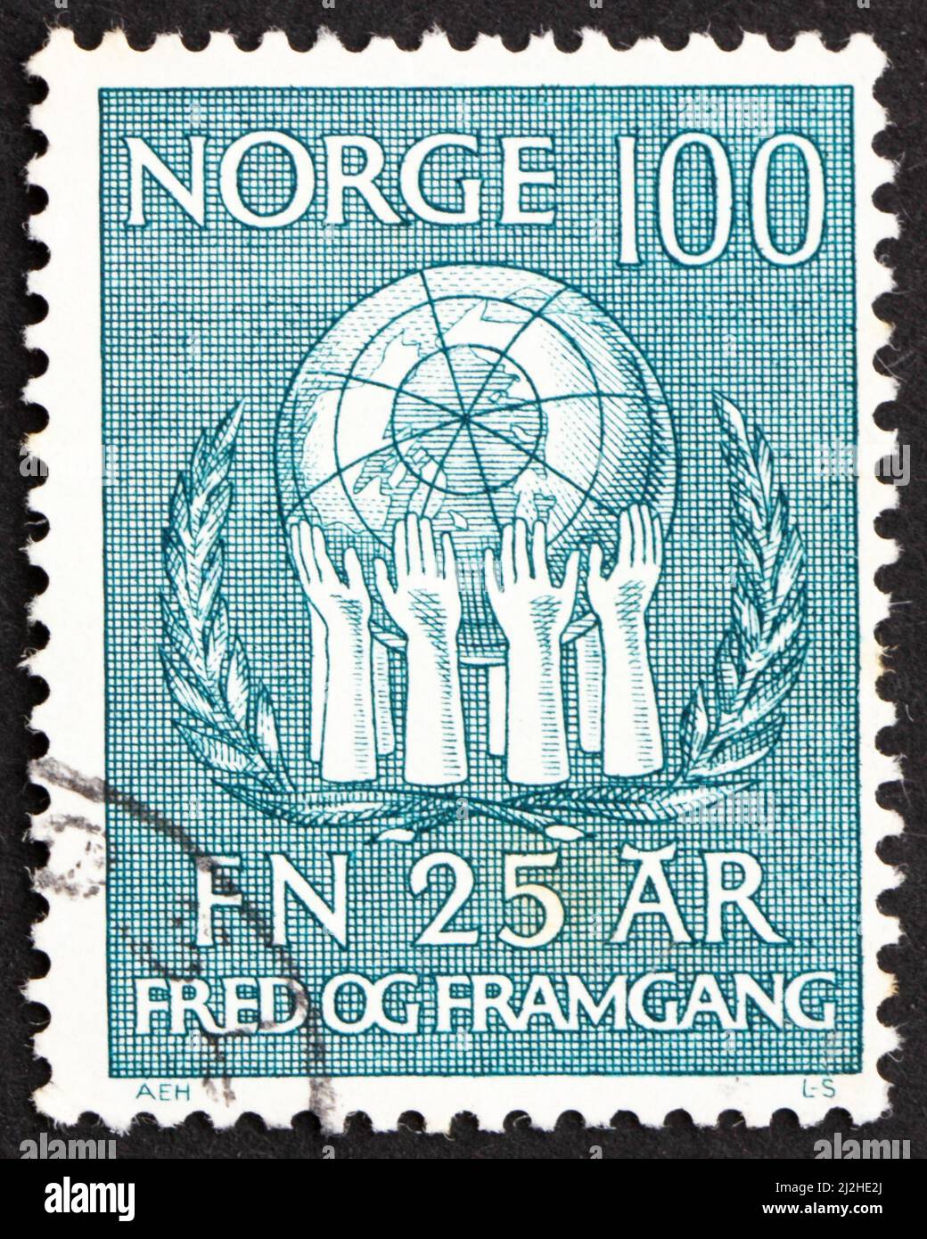 NORWAY - CIRCA 1970: a stamp printed in the Norway shows Olive Wreath and Hands Upholding Globe, 25th Anniversary of the United Nations, circa 1970 Stock Photo