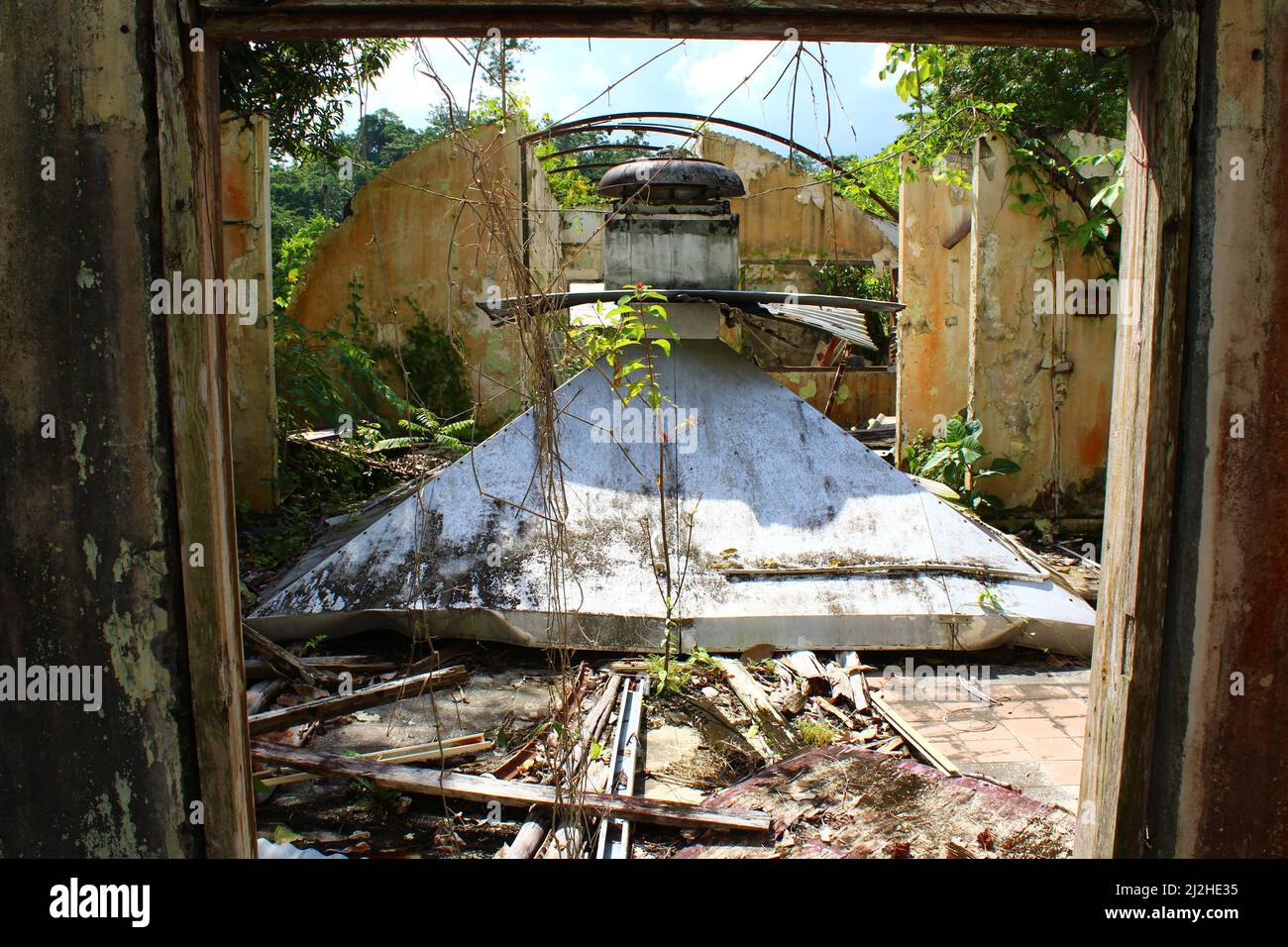 SAN ANTONIO, BELIZE - OCTOBER 26, 2015  ruins of the British Army patrol base at Salamanca Camp Kitchen with fallen roof Stock Photo