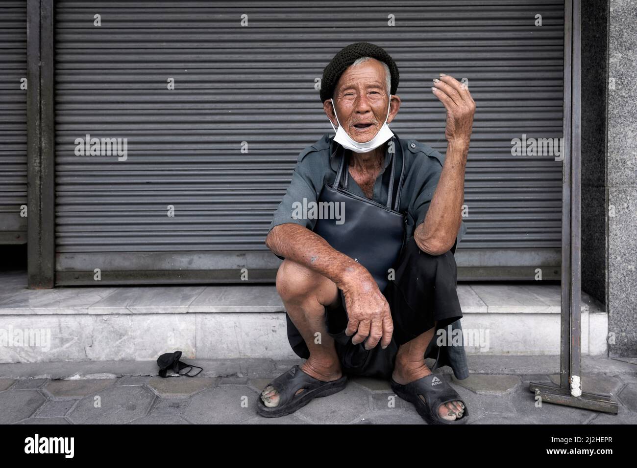 Asian squatting hi-res stock photography and images