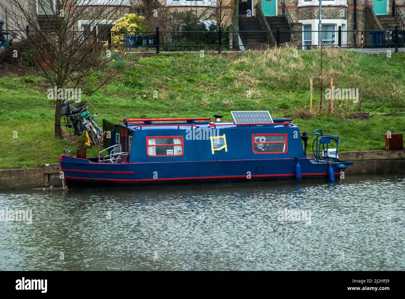 Canal narrow houseboat on English canal river Stock Photo Alamy