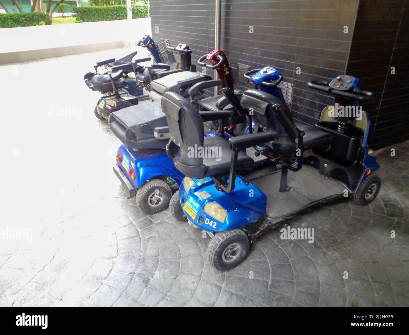 Parked up mobility scooters in the tourist friendly Benidorm resort, Spain Stock Photo