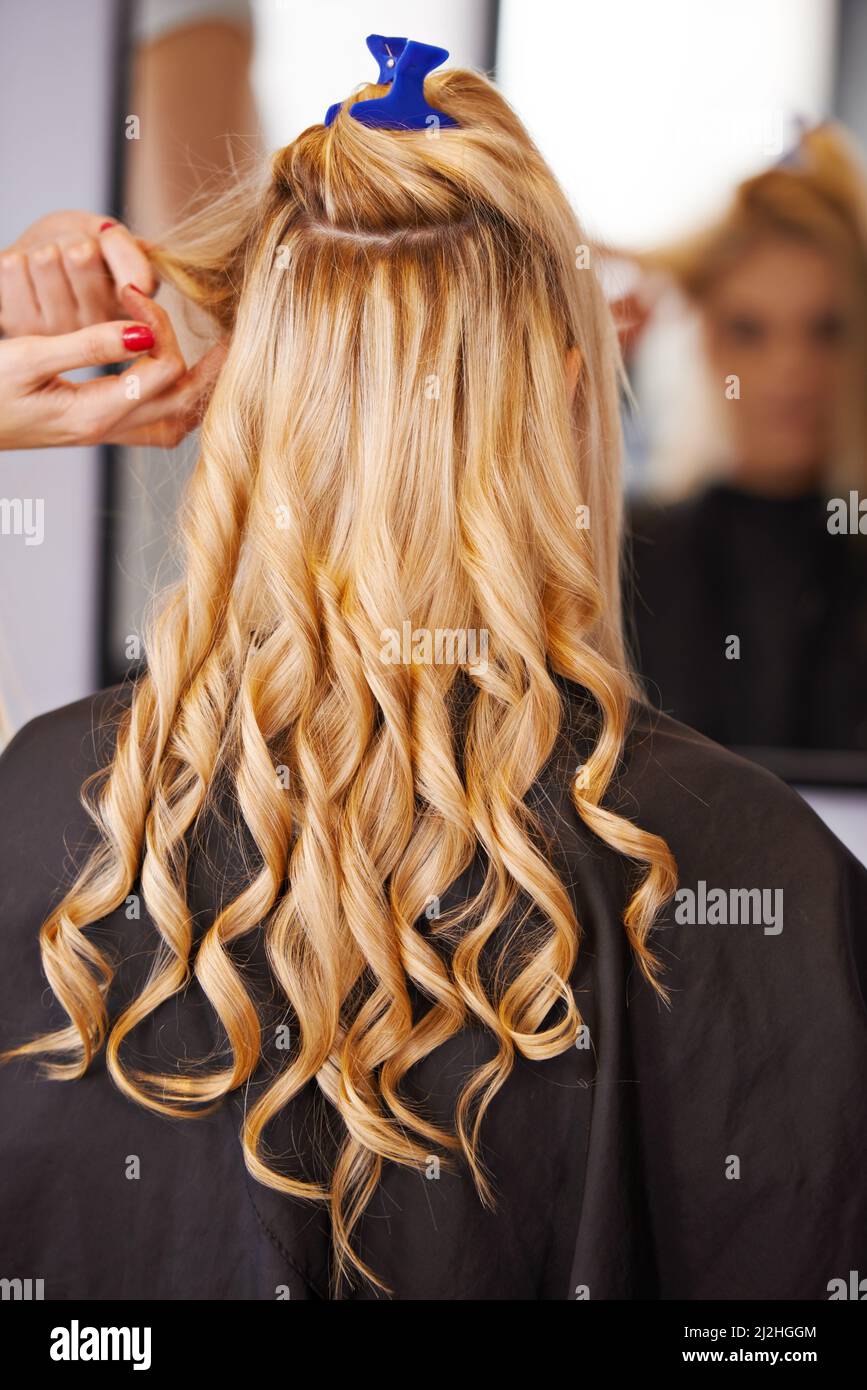 Style in the making.... A blonde woman getting her hair styled in a salon Stock Photo - Alamy Style in the making.... A blonde woman getting her hair styled in a salon Stock Photo - Alamy