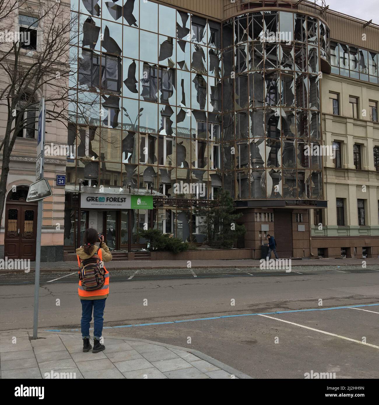 An office building, badly damaged by the explosion of the russian missile,  in downtown of Kharkiv, Ukraine Stock Photo