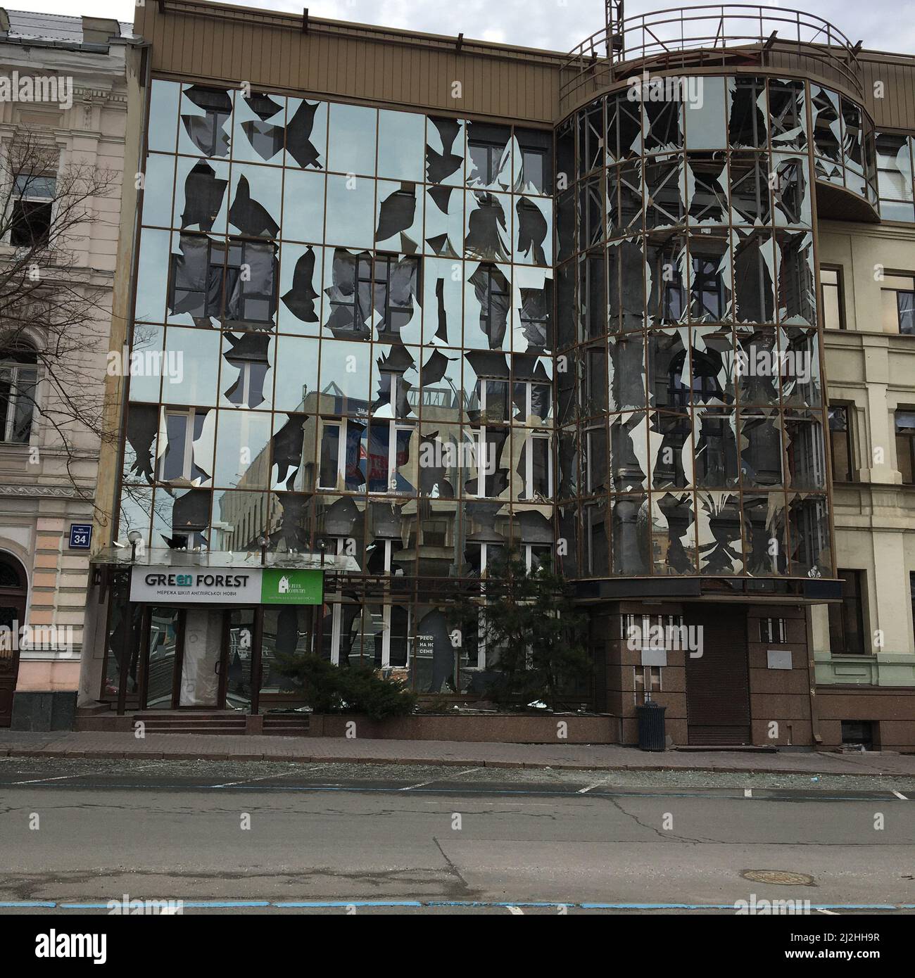 An office building, badly damaged by the explosion of the russian missile,  in downtown of Kharkiv, Ukraine Stock Photo