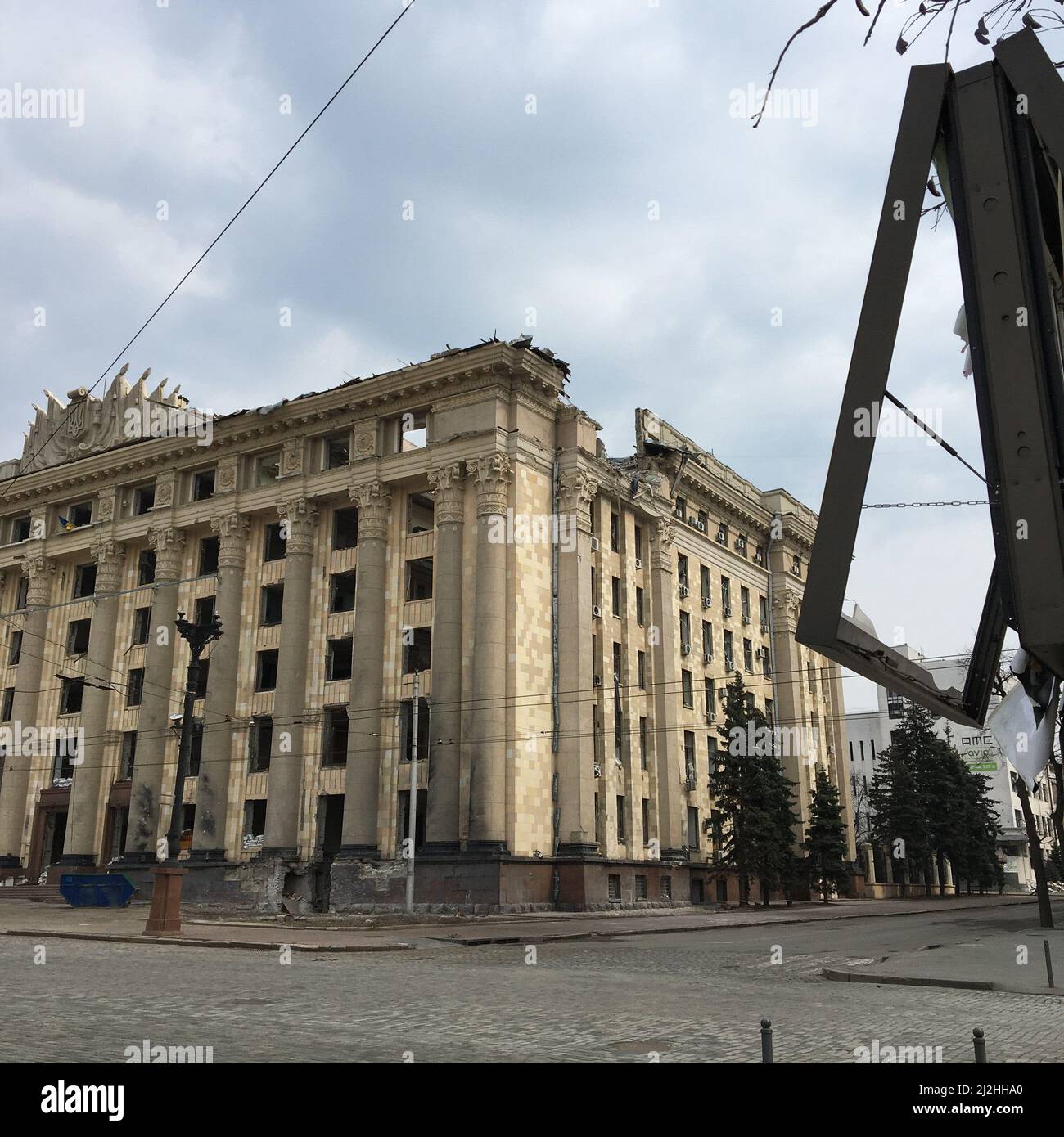 Most central Administrative Building of Kharkiv, Ukraine, hugely damaged by the direct strike of russian missile. Stock Photo