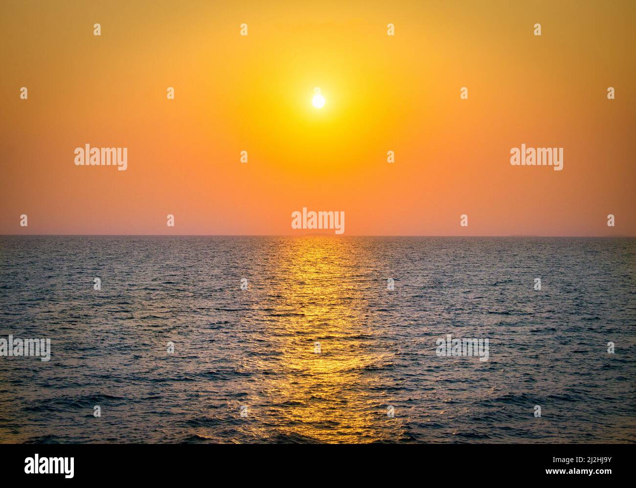 Dramatic sunset over the sea Stock Photo - Alamy