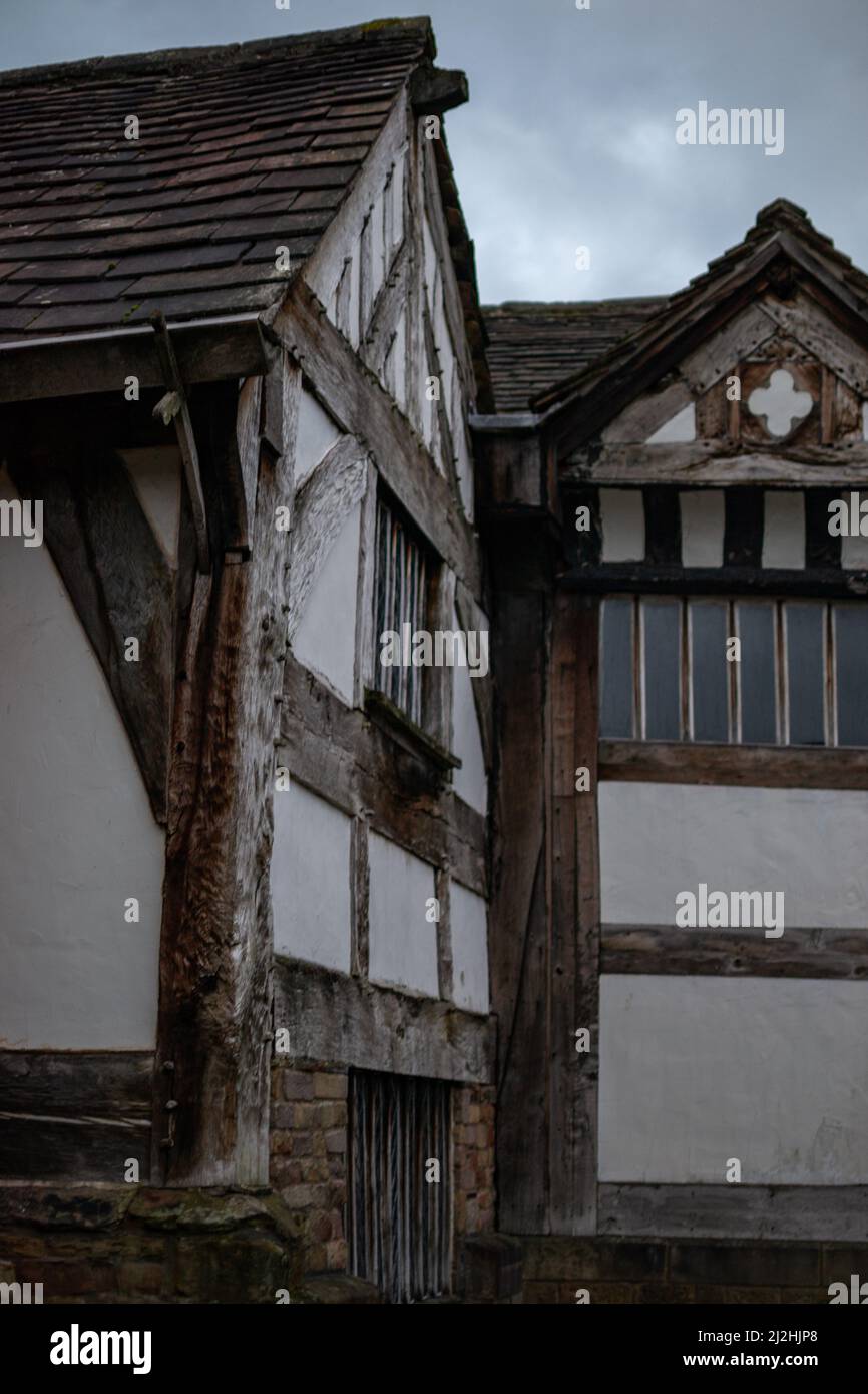 Timber-framed building in a Tudor / medieval style at Smithills Hall, Bolton in Colour Stock Photo