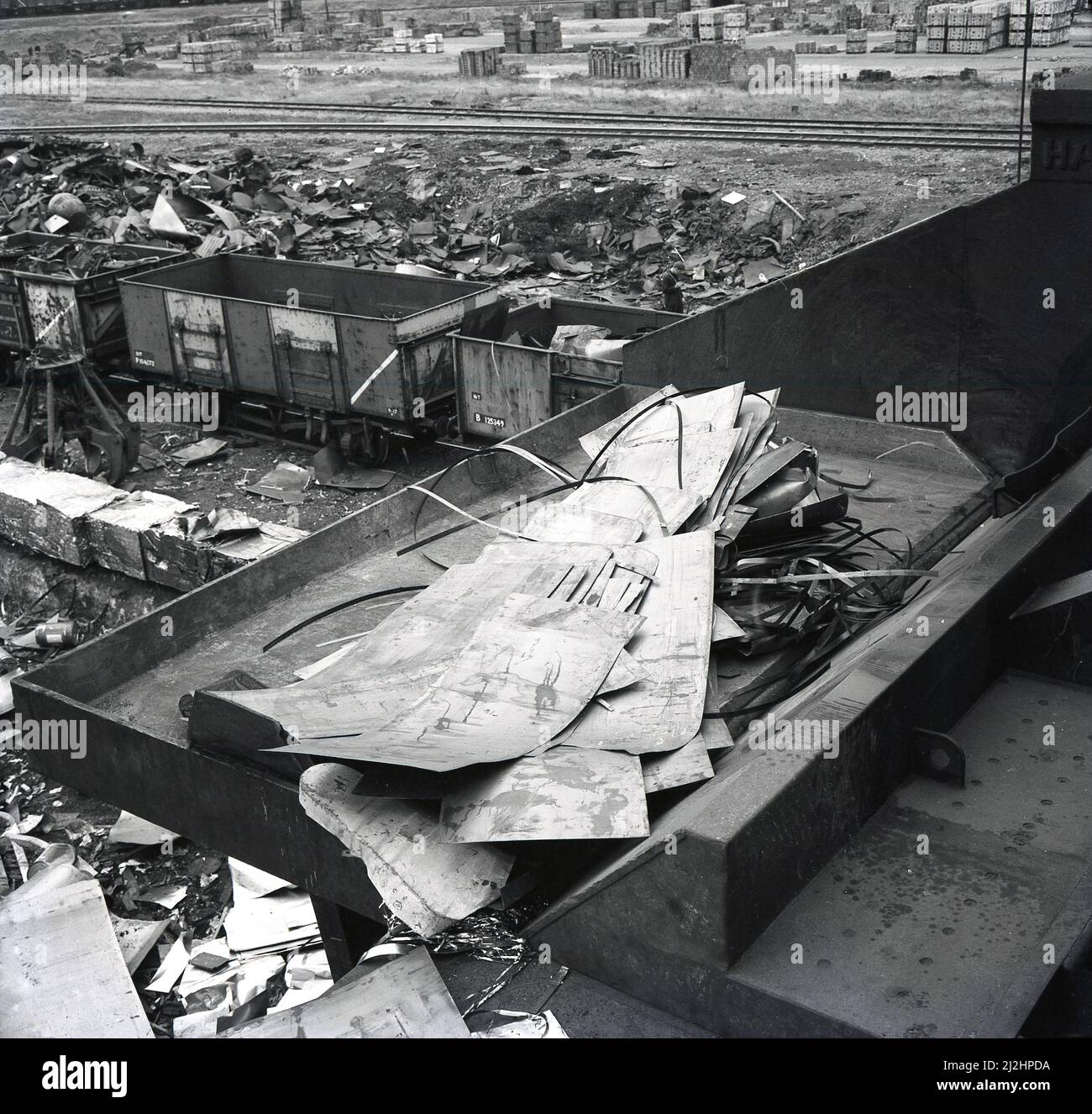 1950s, historical, sheets of steel scrap at a railway side yard with