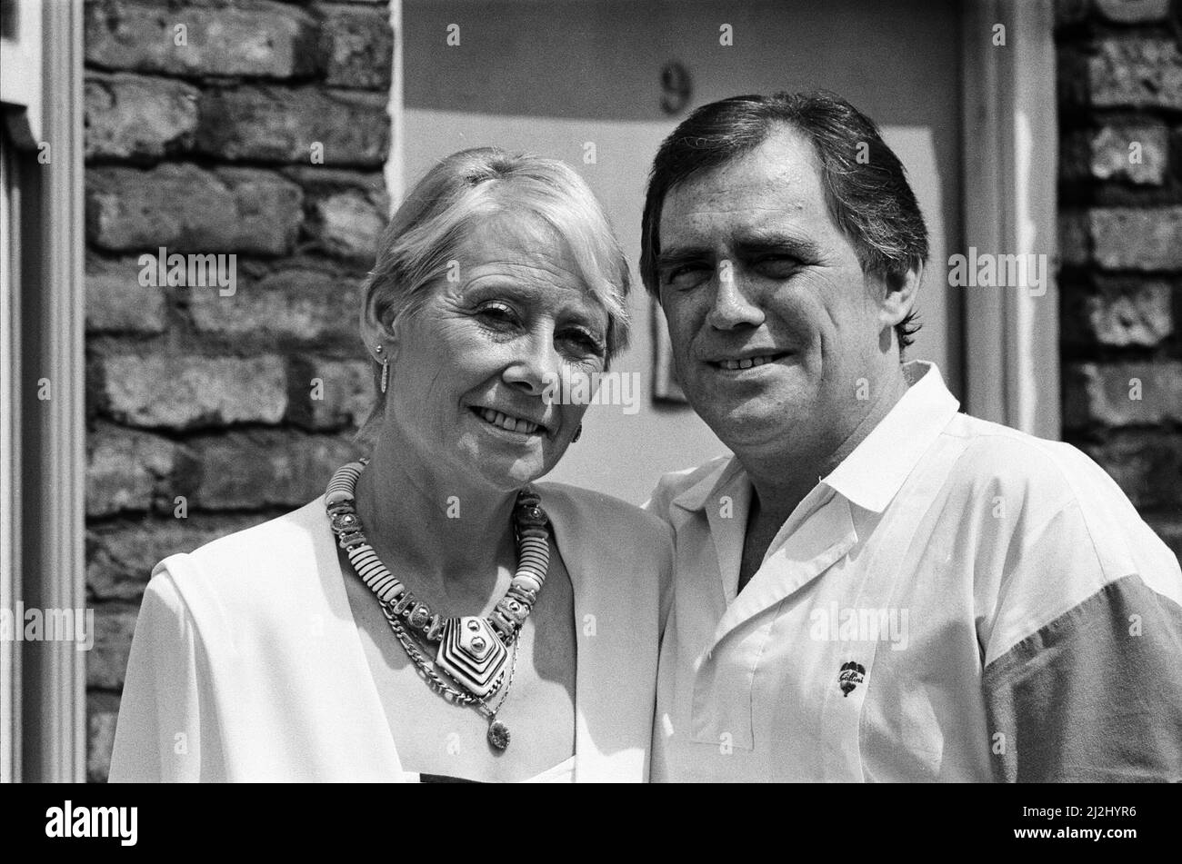 Actor Bill Tarmey (Jack Duckworth) is welcomed back to Granada TV's 'Coronation Street' by his ever loving screen wife Liz Dawn (Vera Duckworth). Bill has been absent from the soap for some months having undergone major heart surgery. 6th July 1987. Stock Photo