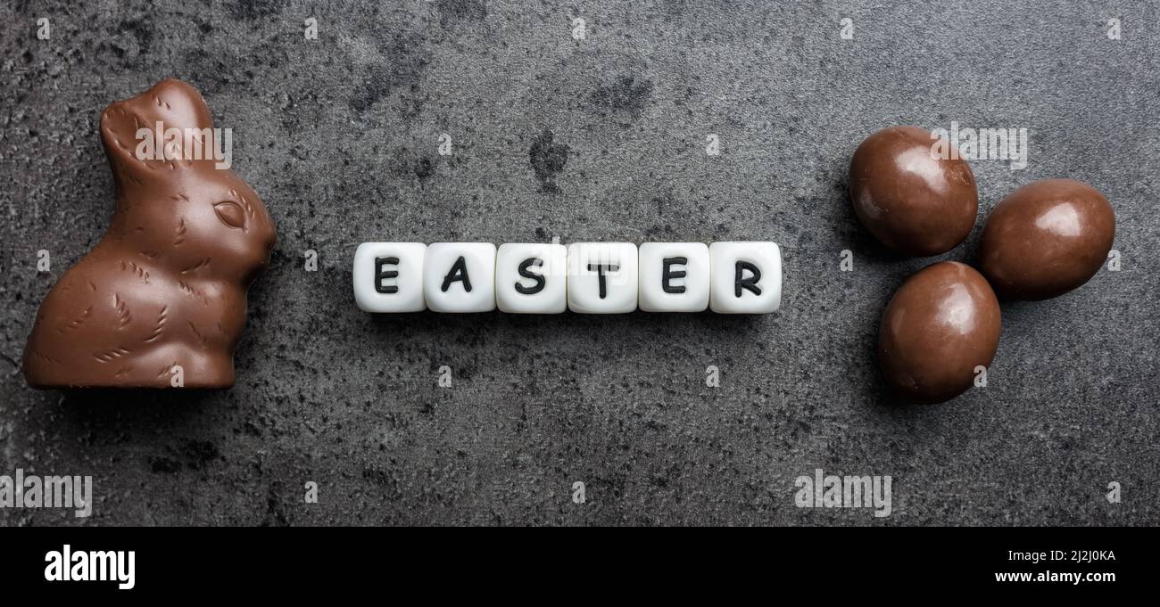Delicious Easter holiday chocolate bunny, eggs and sweets Stock Photo