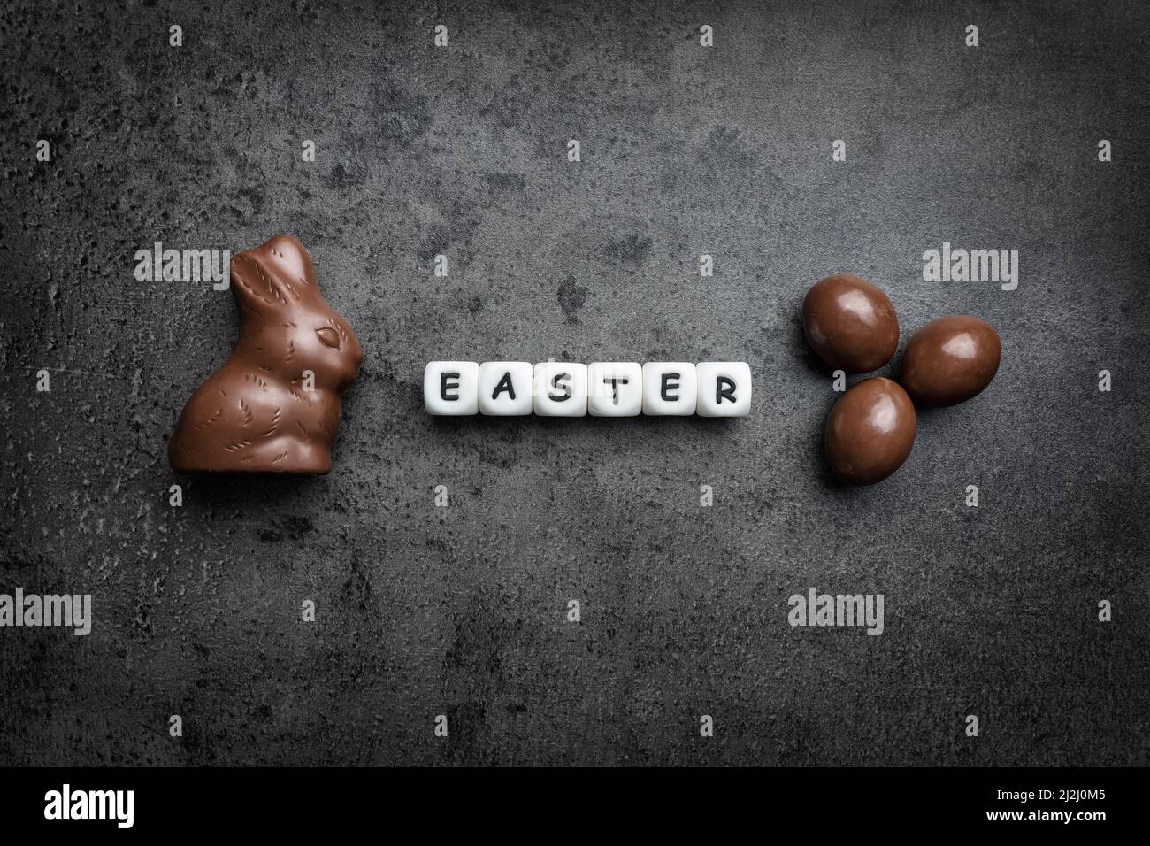 Delicious Easter holiday chocolate bunny, eggs and sweets Stock Photo
