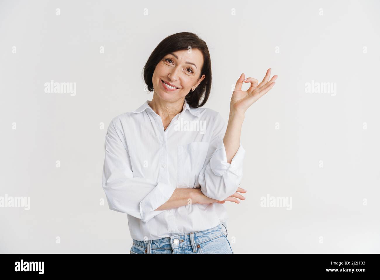 Mature woman showing sign hi-res stock photography and images - Alamy
