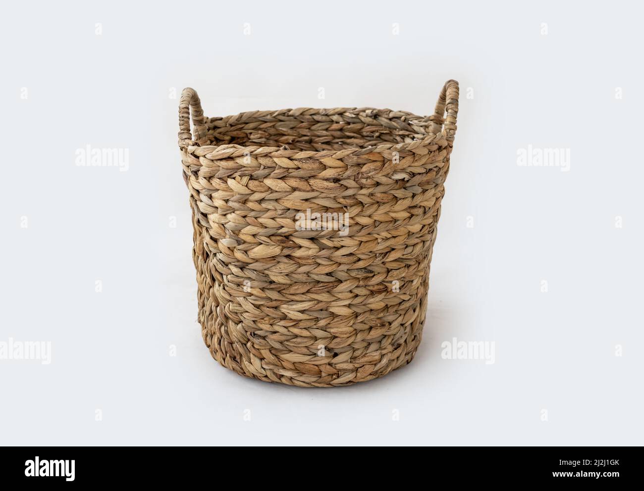 Wicker basket isolated Stock Photo Alamy