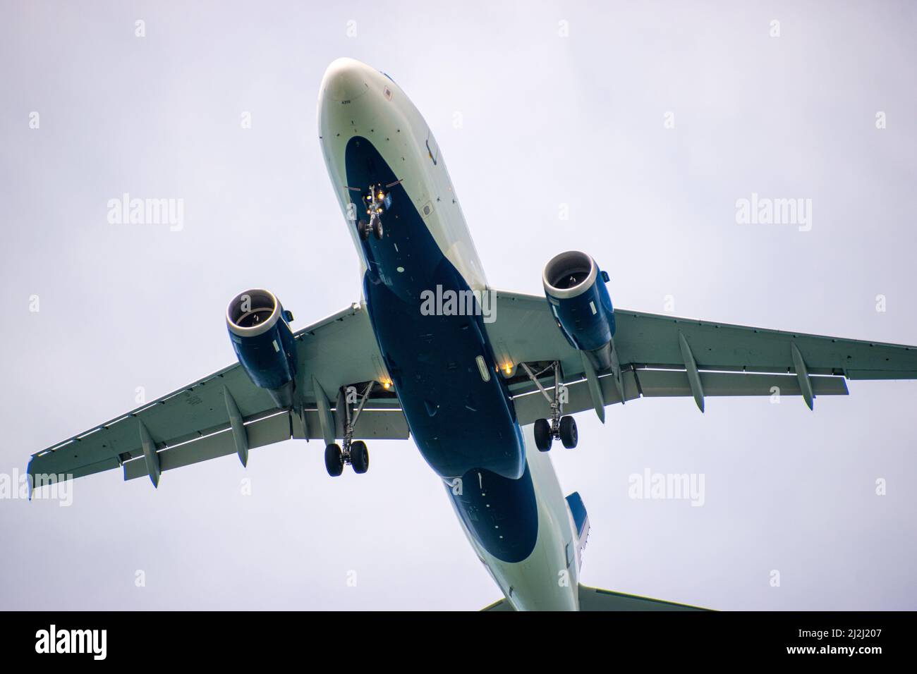 A close up view of a passenger jet airliner on final approach Stock Photo