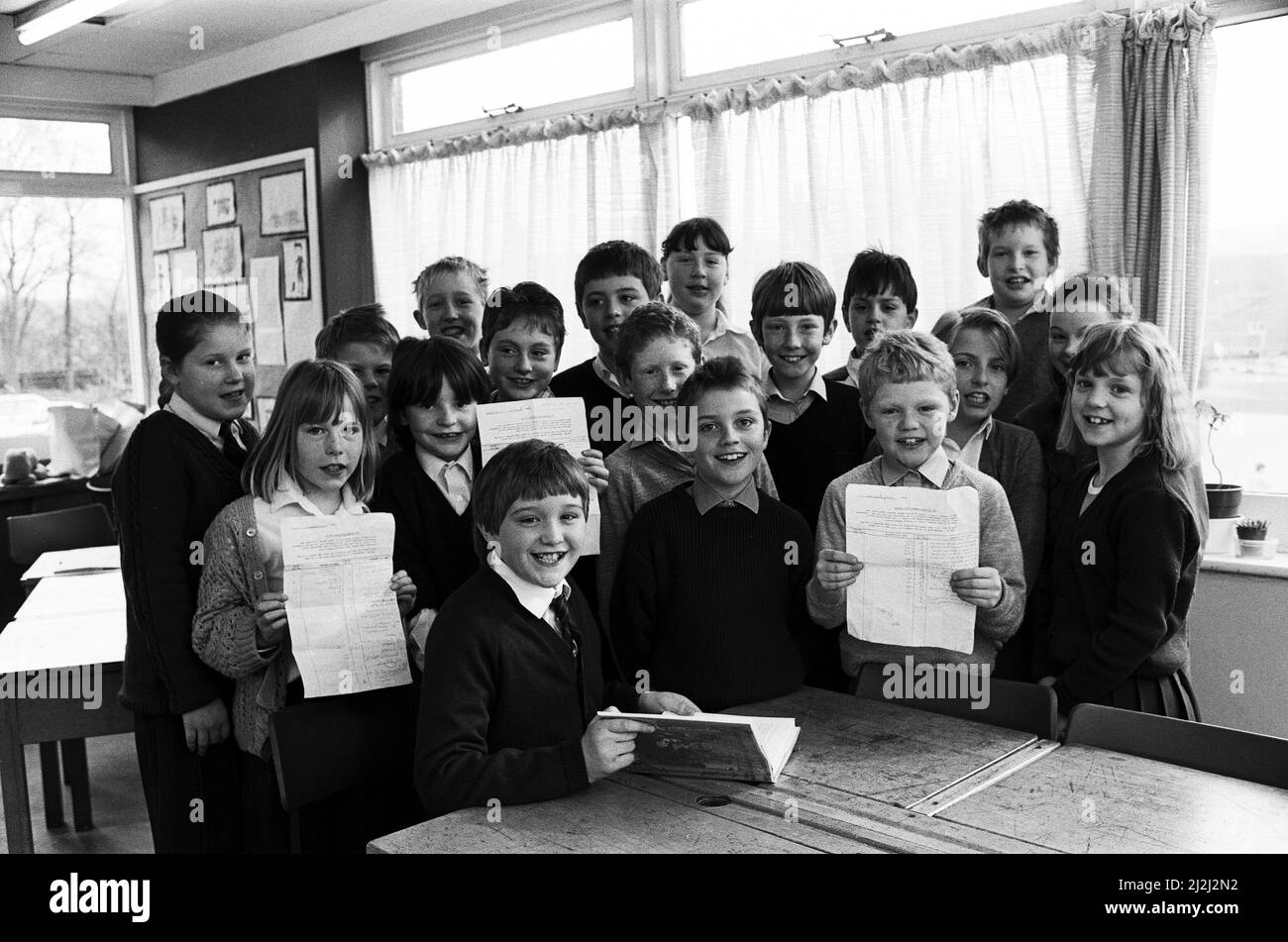 Ready to make a big noise after their sponsored silence for the appeal are these children from South Crosland Junior School. The organiser, nine year old Sally Baines (seated), of Netherton, and her friends raised about £30 by keeping mum for half-an-hour. 31st March 1987. Stock Photo