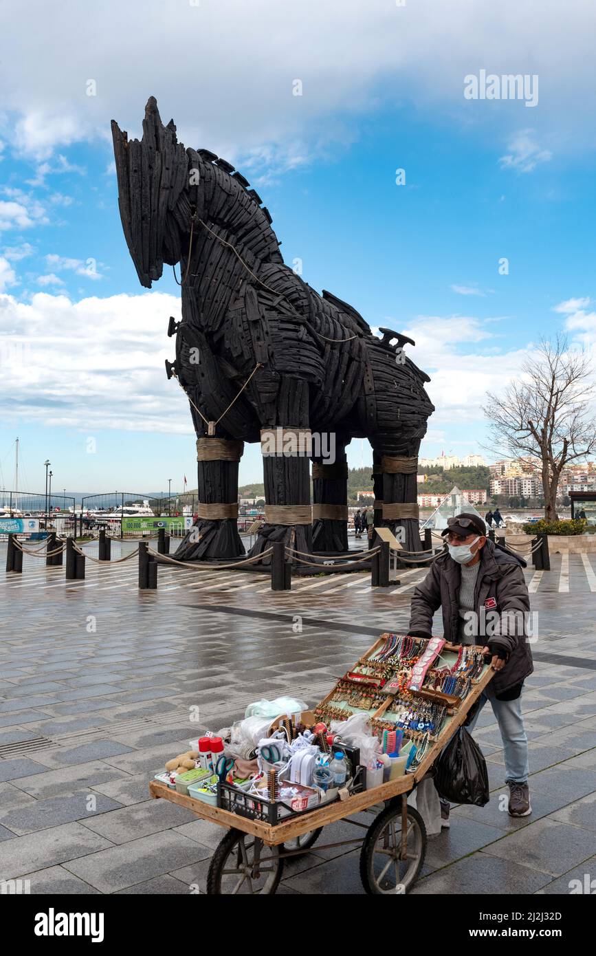 Canakkale, Turkey. February 18th 2022 A street vendor selling souvenirs beside the iconic Trojan horse statue on Canakkale seafront, built for use in Stock Photo