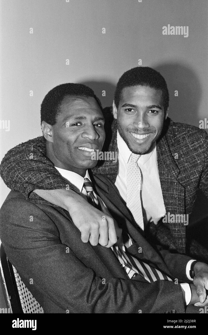 Luther Blissett, (left, in striped tie) and John Barnes (right, in plain tie) pose together in April 1987. Both are football players for Watford.  John Barnes played for Watford, 1981 to 1987. Luther Blissett had three spells for Watford, 1975 to 1983, 1984 to 1988, and 1991 to 1993  Picture taken 6th April 1987 Stock Photo