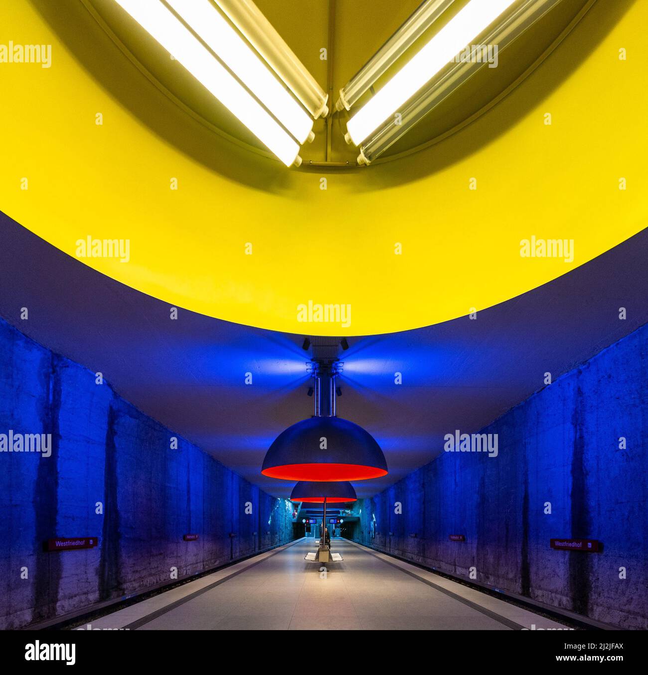 A beautiful shot of underground tunnel with blue and yellow walls and ...