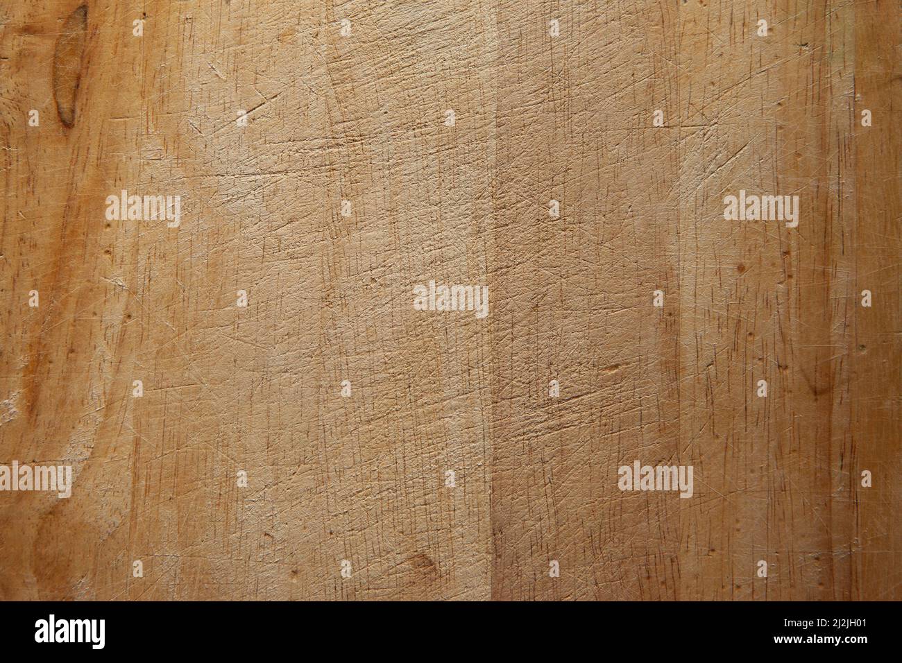 Surface of wooden cutting board, top view. Empty space. Place for text, design, presentation, for pictures of dishes in the restaurant. Food Stock Photo